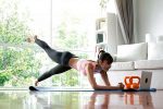 Person doing morning yoga or meditation representing a transformative morning routine